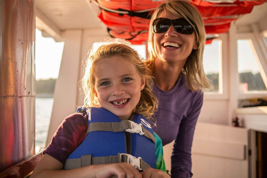 a person wearing a hat and sunglasses