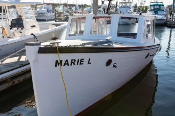a boat docked at a dock