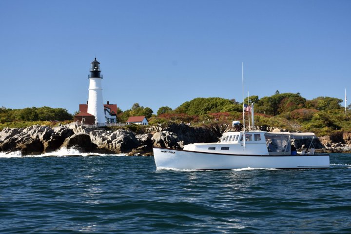 a small boat in a large body of water