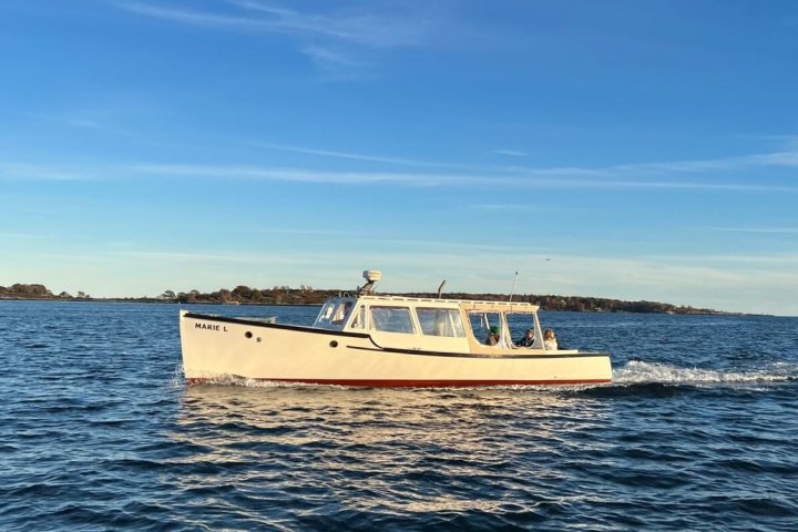 a small boat in a large body of water