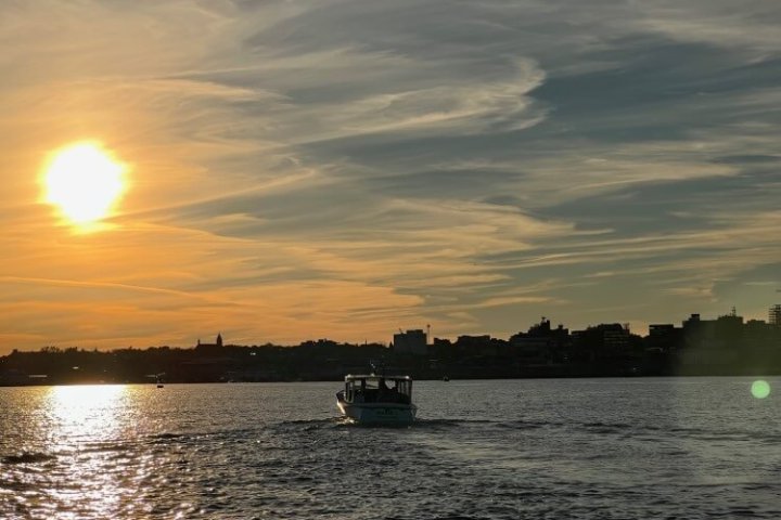 a boat traveling across a large body of water
