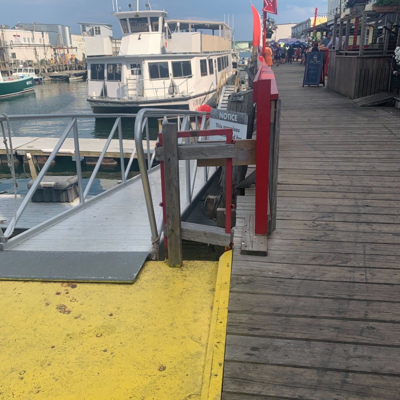 a boat docked at a dock