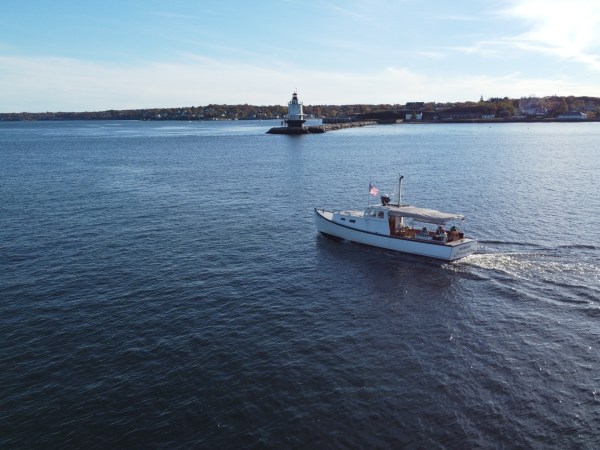 a boat traveling across a large body of water