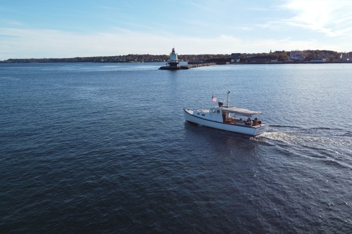 a boat traveling across a large body of water