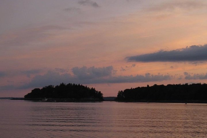 a sunset over a body of water