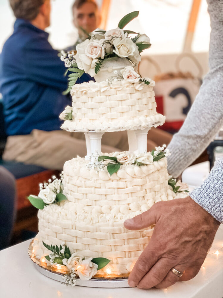 image5 a woman cutting a wedding cake