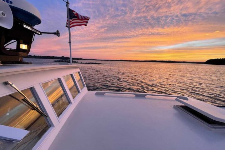 a sunset over a body of water