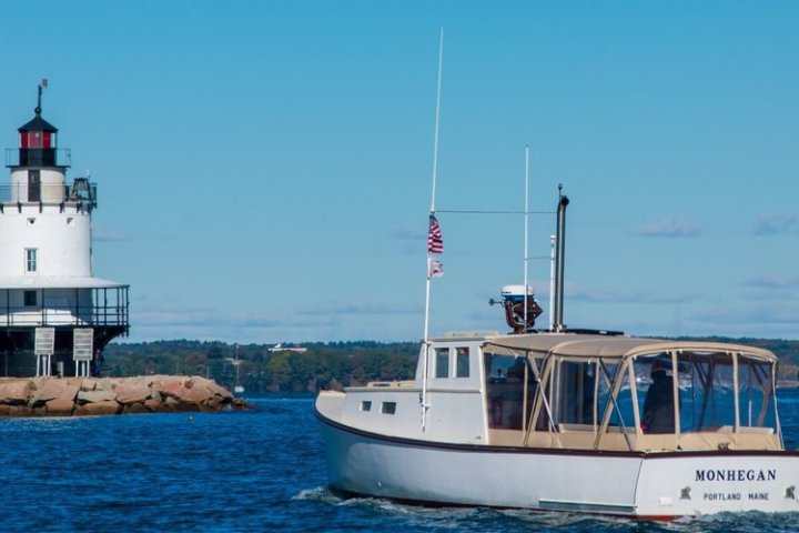 a small boat in a large body of water
