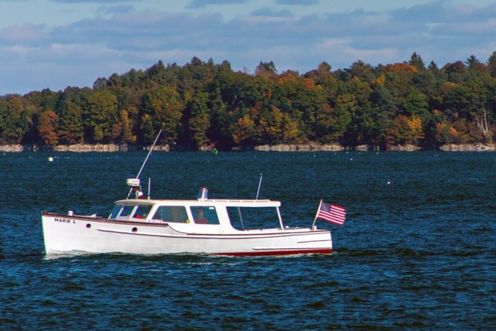 a small boat in a large body of water