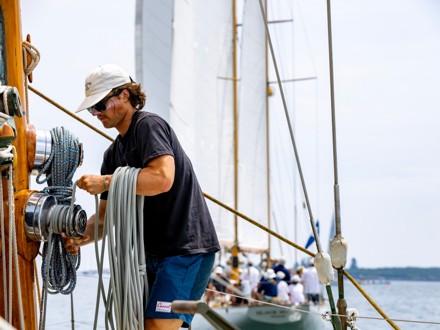 a man standing on a boat in the water