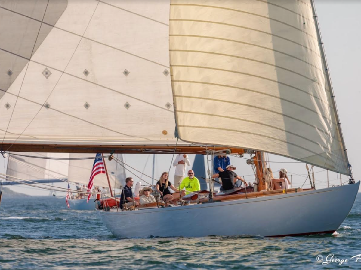a group of people on a boat in the water