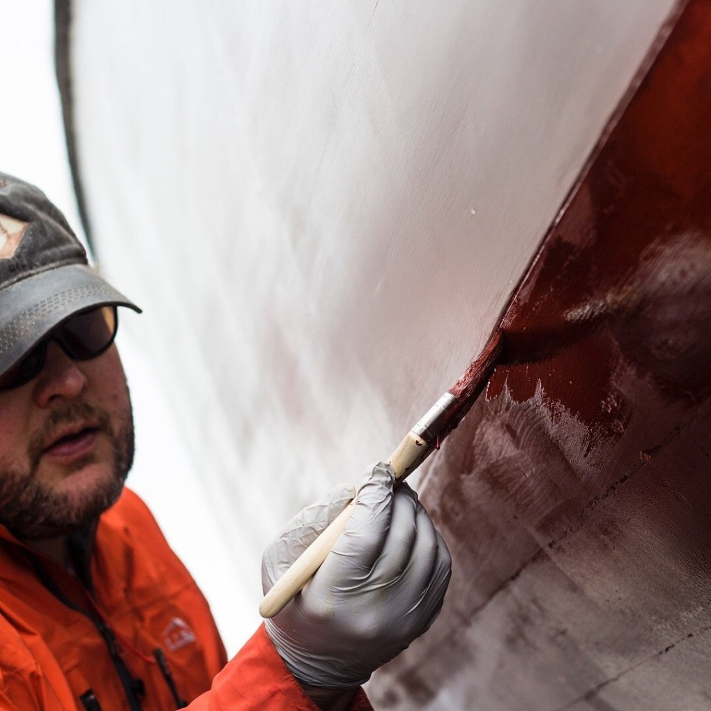 a man holding a baseball bat