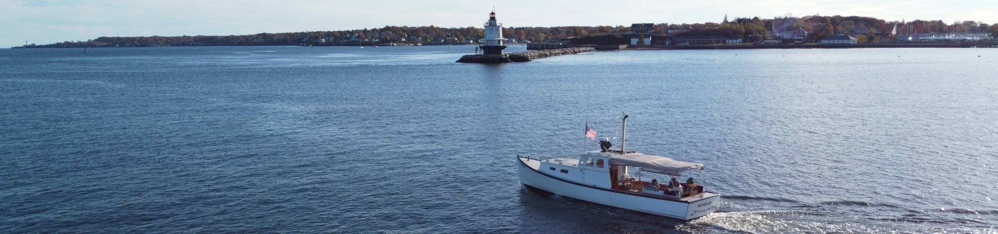 a boat traveling across a large body of water
