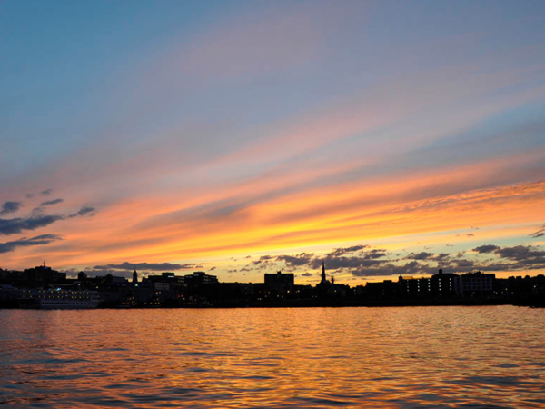 A sunset over Casco Bay in Portland, Maine